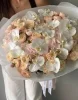 Букет с орхидеей, кустовой розой и гвоздикой